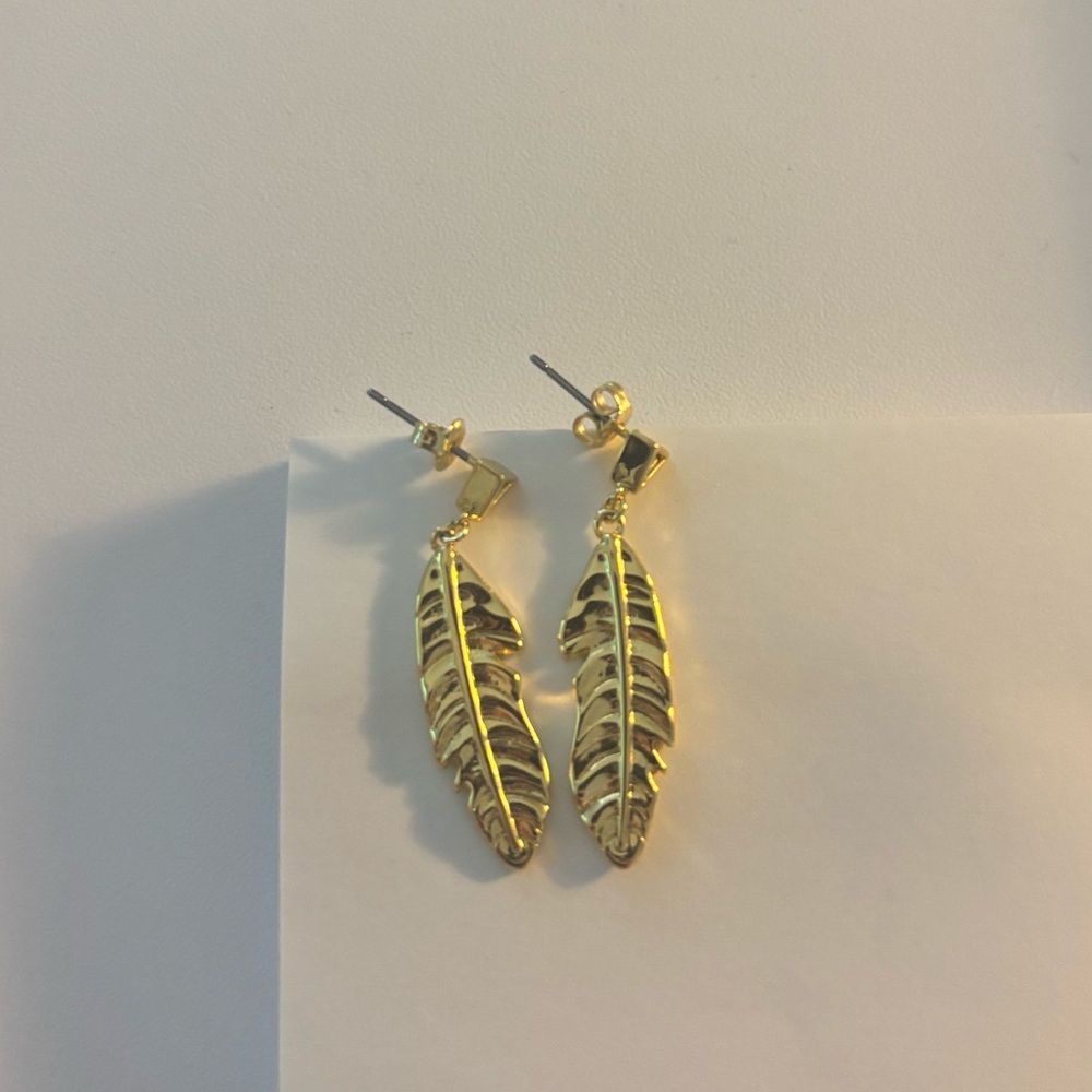 Uncommon James gold color Feather Earrings